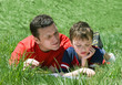 father and son reading