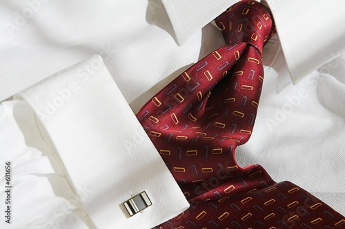 red necktie and dress shirt with cufflink