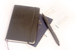 dairy, pen passport and ticket
