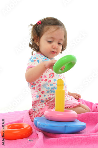 toddler playing with generic toy toddler playing with generic toy