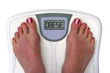 feet on a bathroom scale - isolated