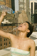 young ethnic girl cooling off
