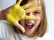 girl play with yellow color