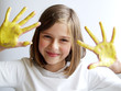 girl with yellow hands