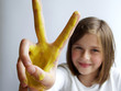 girl with yellow hand