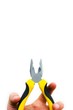 black and yellow pliers