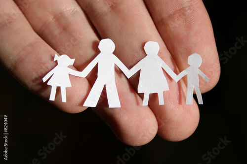 Photo: paper family on hand paper family on hand