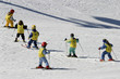 children learning to ski