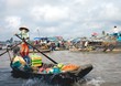woman on the floating market, mekong delta woman on the floating market, mekong delta