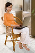 clipping path! woman with laptop on the chair