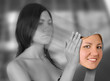 young woman holding smiling face young woman holding smiling face
