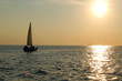 yacht sailing in the sunset