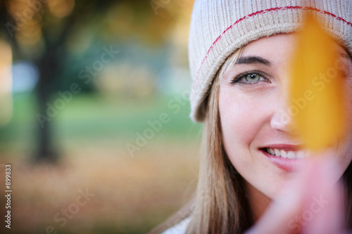 woman holding leaf