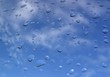drop of rain on blue sky