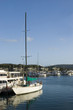 a sailboat in hamilton island marina