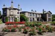 house and rose beds