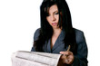 business woman holding a newspaper and pen