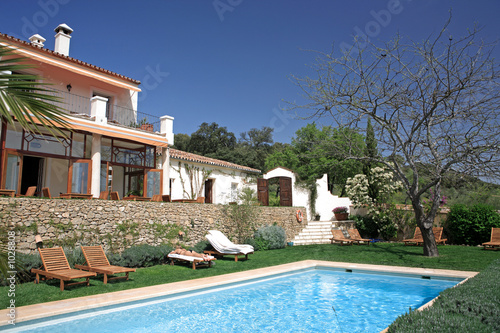 luxury rustic hotel and swimming pool in countryside