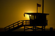 lifeguard tower at sunset with american flag