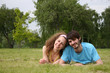 couple falling in love on grass couple falling in love on grass