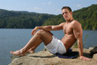 muscular teen at the beach