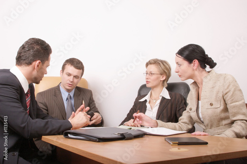 business meeting of 4 persons