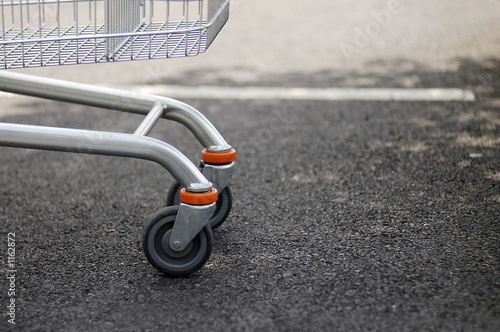 Photo: front wheels of shopping trolley front wheels of shopping trolley