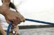 Foto: pulling the rope while sailing pulling the rope while sailing