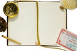 old blank book with compass, shells, pencil