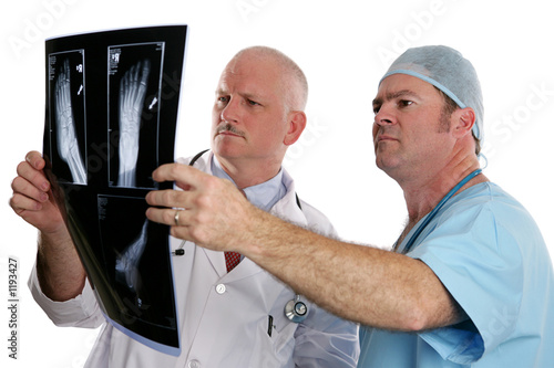 Photo: doctors examining xrays doctors examining xrays