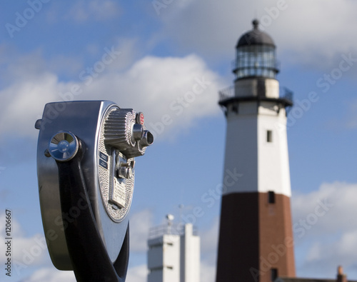 Photo: binoculars and lighthouse binoculars and lighthouse