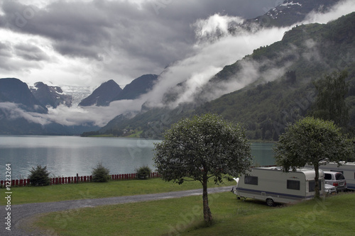 camping by the mountain lake with mountains and gl