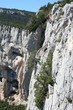 tanned woman abseiling
