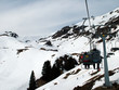 people on ski chairlift