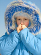 girl trying to warm fingers