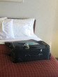 luggage in hotel room