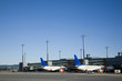 two airliners at the gate - no logos in picture!