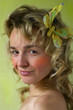 portrait of young curly smiling blonde.