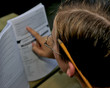nerd doing his homework.