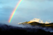 a colourful raibow after summer rain