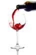 red wine pouring down from a wine bottle