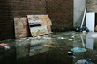 trash in flooded alley trash in flooded alley