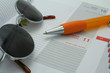 glasses, pen and calendar
