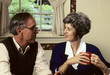 senior couple talking at home