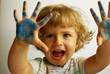 little girl with blue hands
