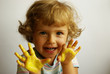 girl with yellow hands