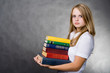 Foto: girl carrying books girl carrying books