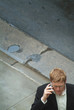 man on street with phone