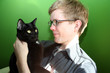 petowner with cat at home