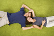 young couple on green carpet